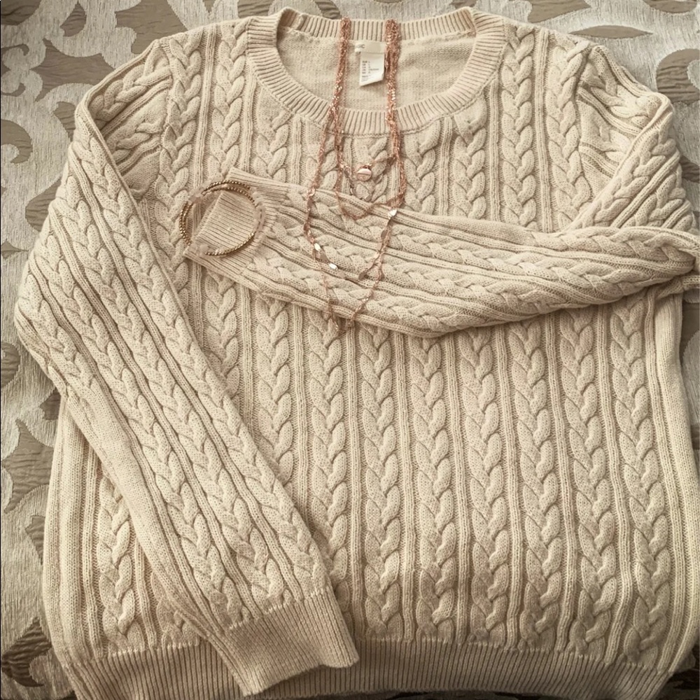 Sophisticated cream colored sweater